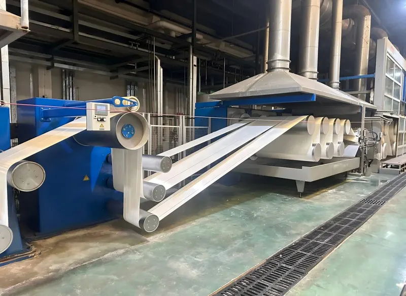 Polyester fiber tow passing through post-spinning drawing equipment